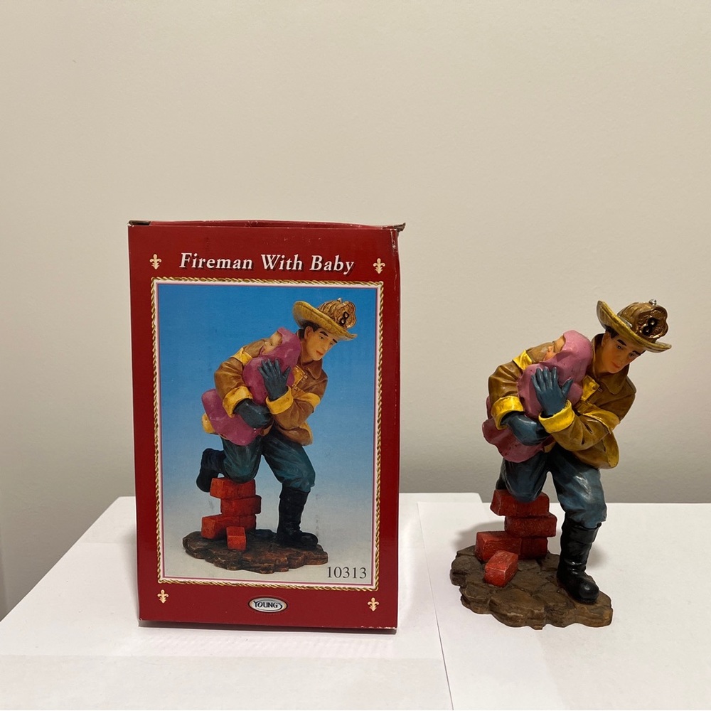Vintage Young's INC 2000 Fireman With Baby Figurine #10313 Decor Collectibles